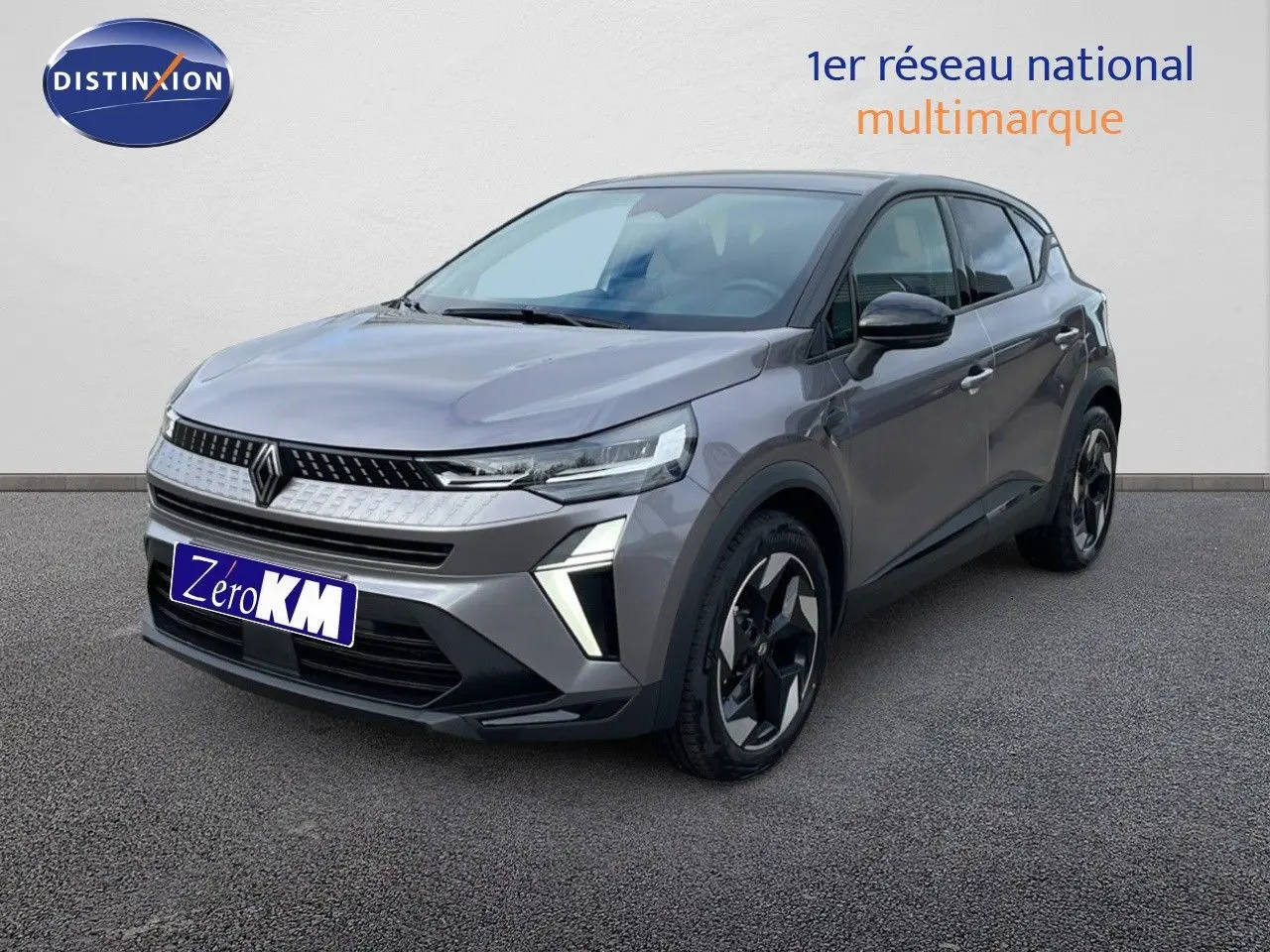 Renault Captur E-Tech hybride gris cassiopée 3/4 avant droit avec toit noir et jantes biton.