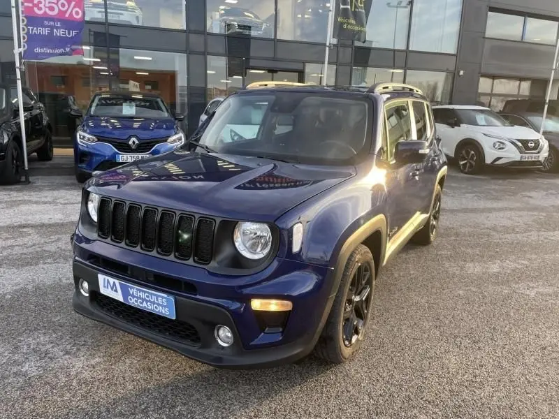 Jeep Renegade bleu Jetset Metal en 3/4 avant droit, avec calandre noire et jantes noires brillantes.