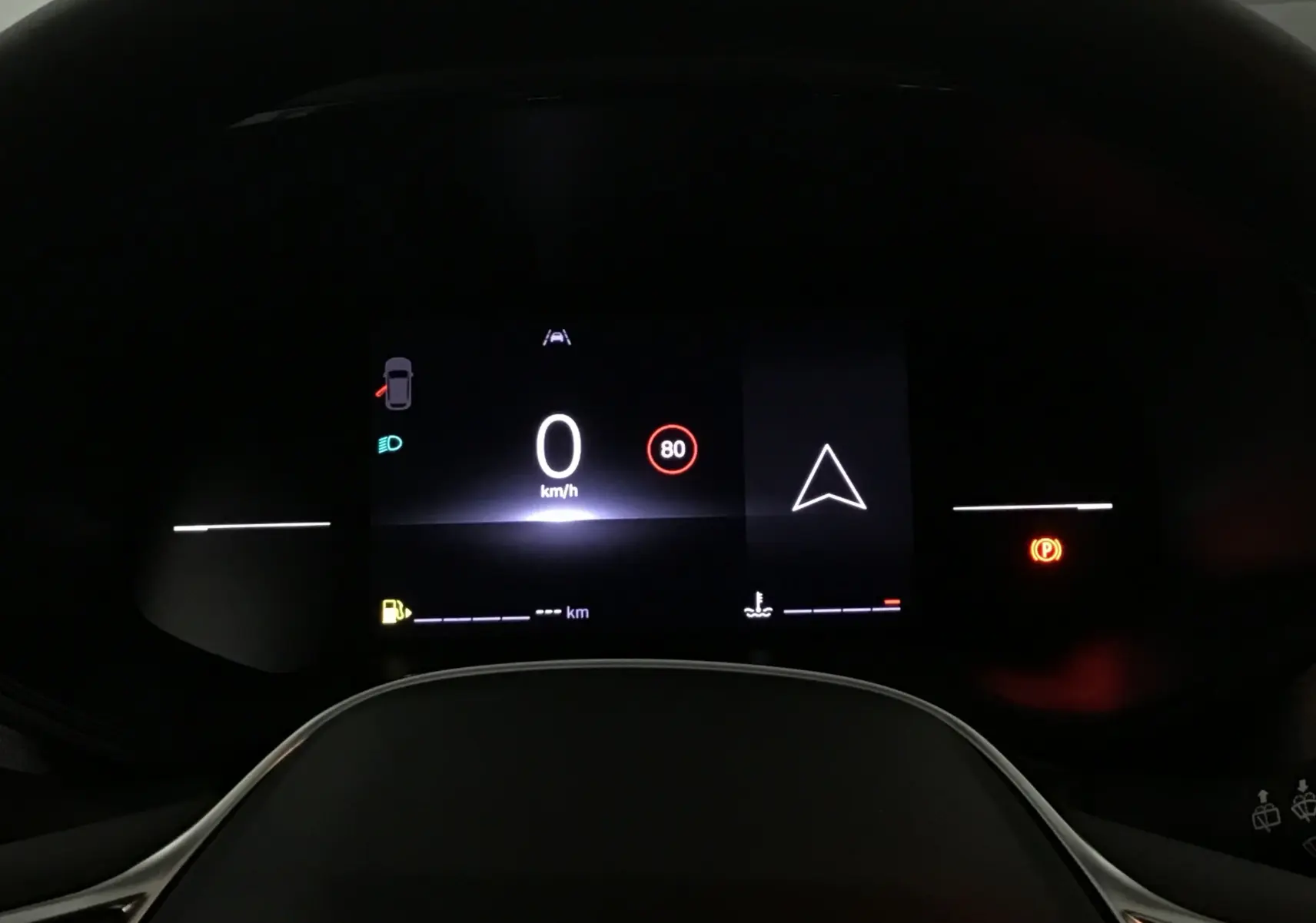Tableau de bord numérique allumé d'une Renault Clio V gris Rafale, affichant vitesse à 0 km/h et limite à 80 km/h.