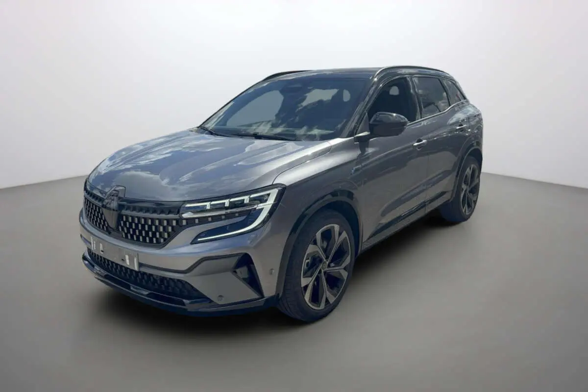 Renault Austral 200 Esprit Alpine gris schiste avec toit noir, vue 3/4 avant droit mettant en valeur ses phares LED et jantes 20 pouces.