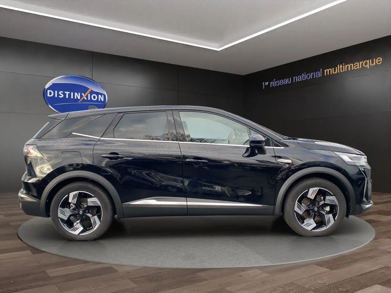 Renault Symbioz 1.6 E-Tech Full Hybrid 2025 noir étoile, vue profil côté gauche, jantes alliage distinctives.