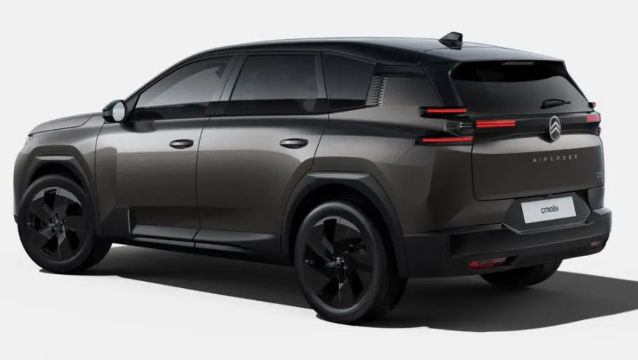 Vue 3/4 arrière droite du Citroën C5 Aircross 2026 bi-ton gris platinium et toit noir avec feux arrière LED distinctifs.