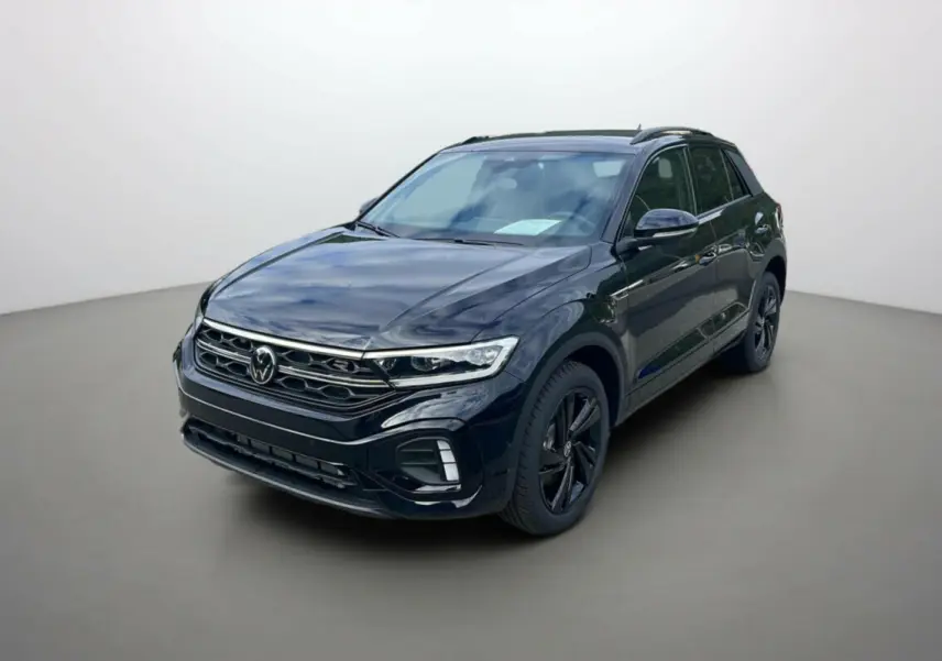 Volkswagen T-Roc TDI 150 R-Line Black noir grenadilla en 3/4 avant droit avec jantes alu noires et barres de toit.