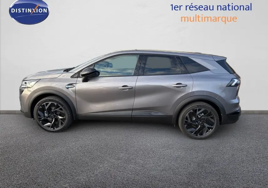 Profil latéral droit du Renault SYMBIOZ gris Cassiope avec jantes noires distinctives et lignes sculptées.