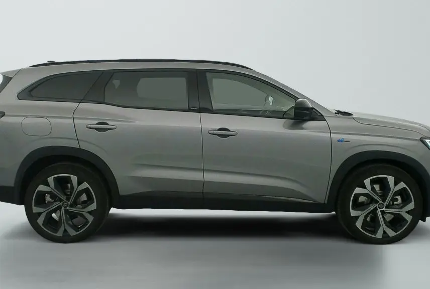 Profil droit d'un Renault Espace 2025 gris schiste avec jantes alliage 20'' Daytona et toit panoramique fixe.