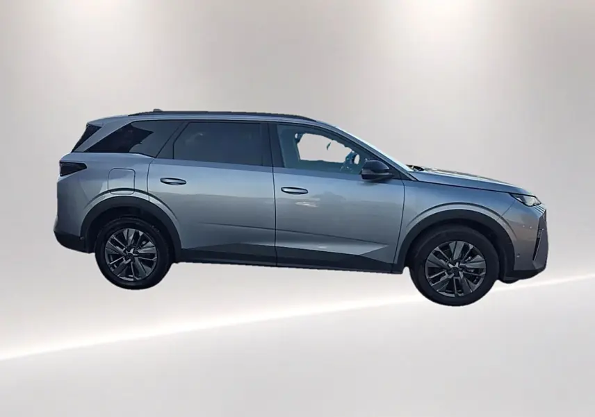 Profil droit du Peugeot 5008 Hybrid 145 allure e-dcs6 gris artense avec jantes alu et vitres surteintées.