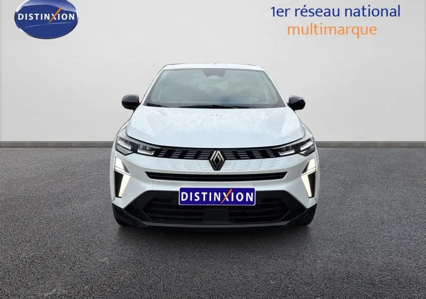 Vue frontale du Renault Symbioz blanc nacré avec signature lumineuse LED distinctive et calandre noire.