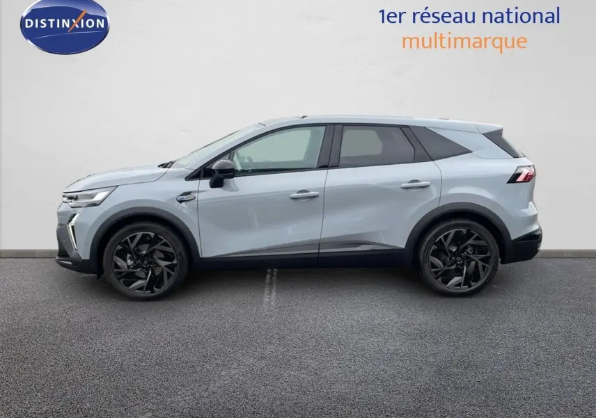 Vue de profil côté gauche du Renault Symbioz gris Rafale Métal avec jantes noires et lignes modernes.