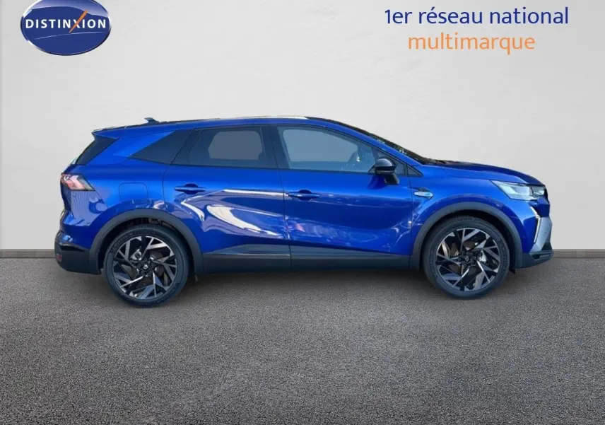 Profil côté droit du Renault Symbioz E-Tech Full Hybrid 145 Esprit Alpine en bleu Iron Metal, avec jantes noires stylisées.
