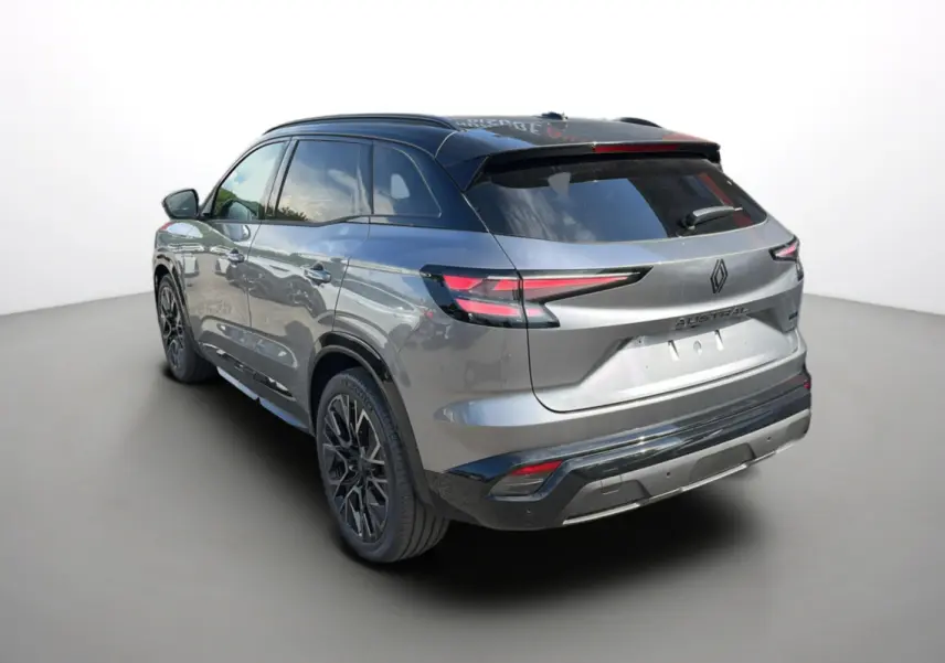 Renault Austral gris schiste avec toit noir, vue 3/4 arrière droit, feux arrière LED et jantes alu noires.
