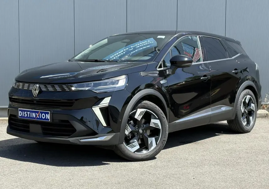 Renault Symbioz noir étoile en 3/4 avant droit, avec jantes 18 pouces et calandre moderne lumineuse.