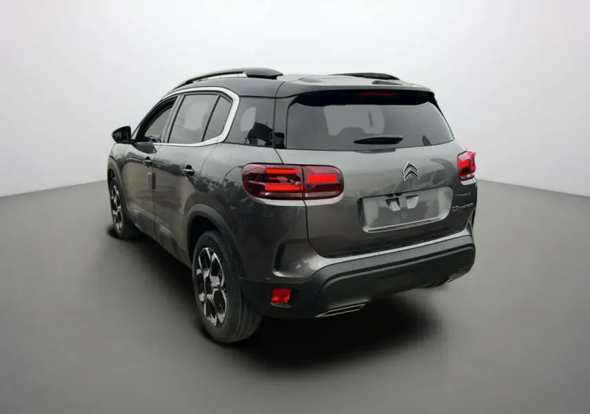 Citroën C5 Aircross Hybrid 145 E-DSC6 Max 2025 en gris platinium avec toit noir, vue 3/4 arrière droit.