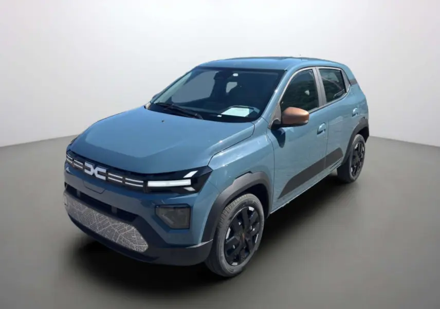 Dacia Spring électrique 65 Extrême bleu ardoise en 3/4 avant droit avec rétroviseurs cuivrés et jantes noires.