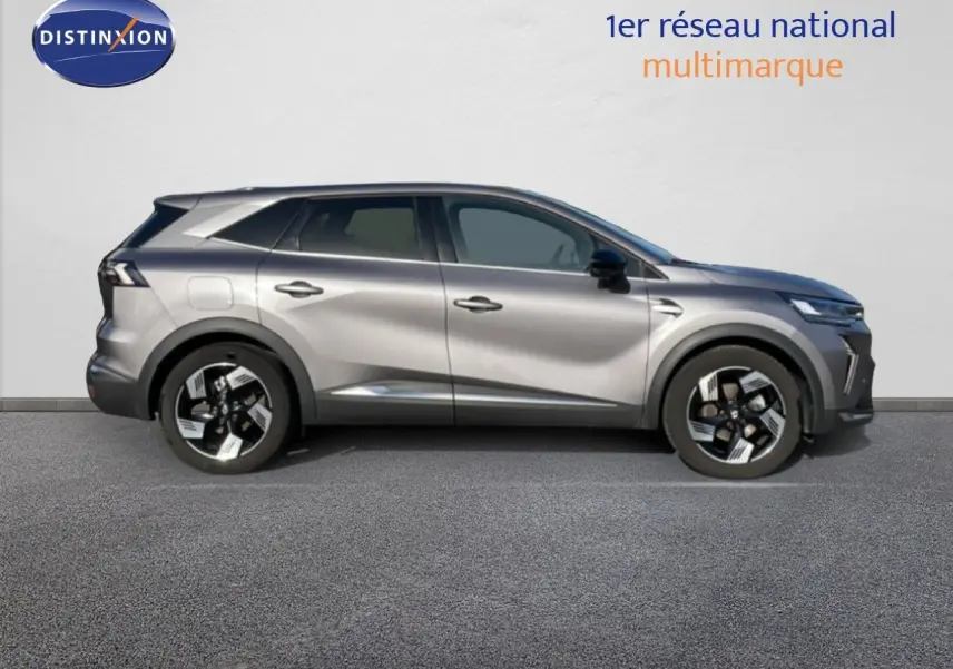 Renault Symbioz gris cassiopée métal vu de profil côté gauche, avec jantes noires et détails modernes.