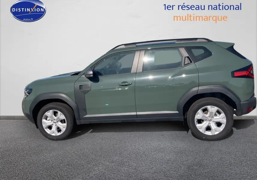 Vue latérale droite du Dacia Duster 2026 en kaki lichen avec jantes alu et barres de toit noires.