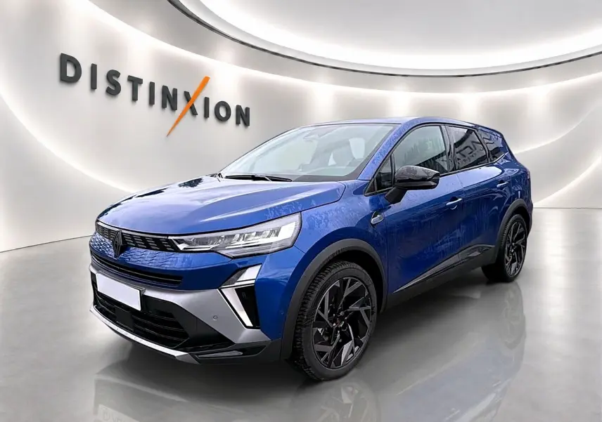 Renault Symbioz 2026 bleu iron en 3/4 avant droit, avec jantes noires et signature lumineuse LED distinctive.