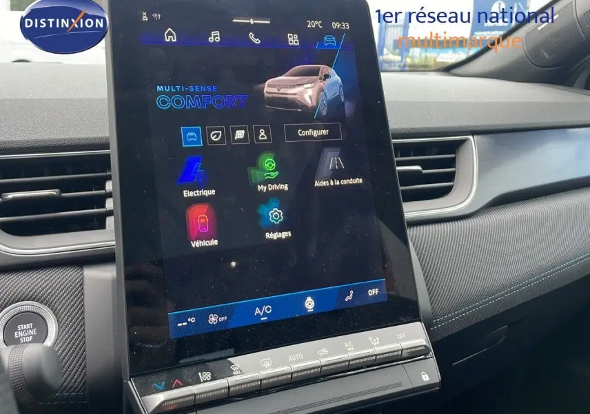 Écran tactile central affichant les réglages de conduite du Renault Symbioz gris Rafale, intérieur moderne et épuré.