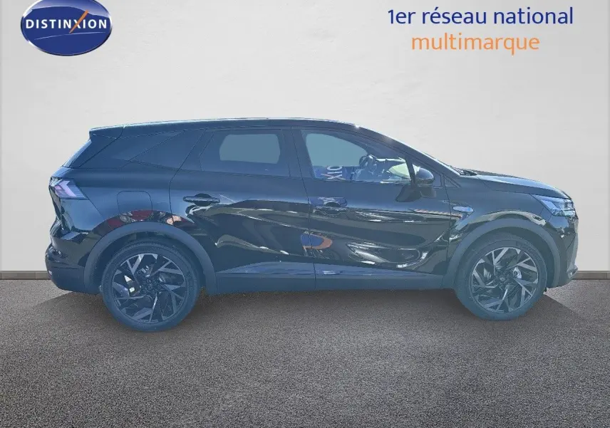 Profil droit du Renault Symbioz 2025 noir étoile métal, SUV hybride avec jantes noires et lignes fluides.