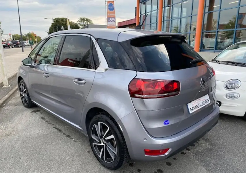 Citroën C4 Spacetourer gris Artense vue 3/4 arrière droit, jantes alliage bi-ton et vitres teintées.
