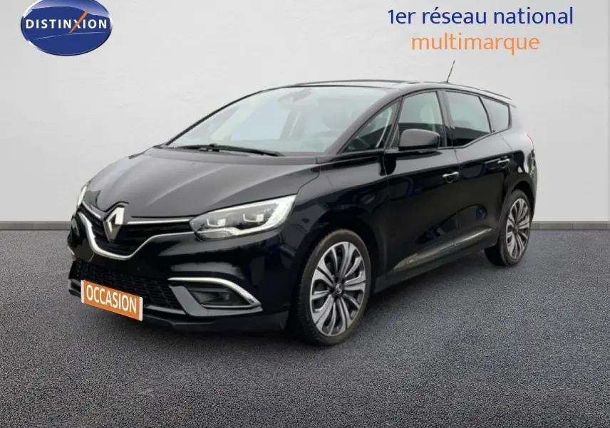 Renault Grand Scénic noir étoile métal en 3/4 avant droit, avec jantes alliage et calandre chromée visible.