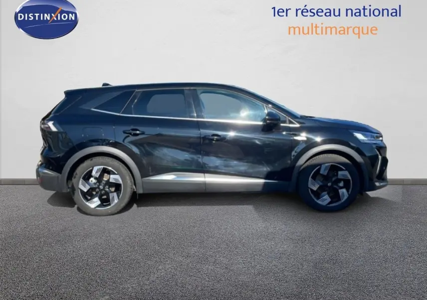 Profil droit du Renault Symbioz 2025 noir étoile métal, SUV hybride avec jantes au design moderne et lignes dynamiques.