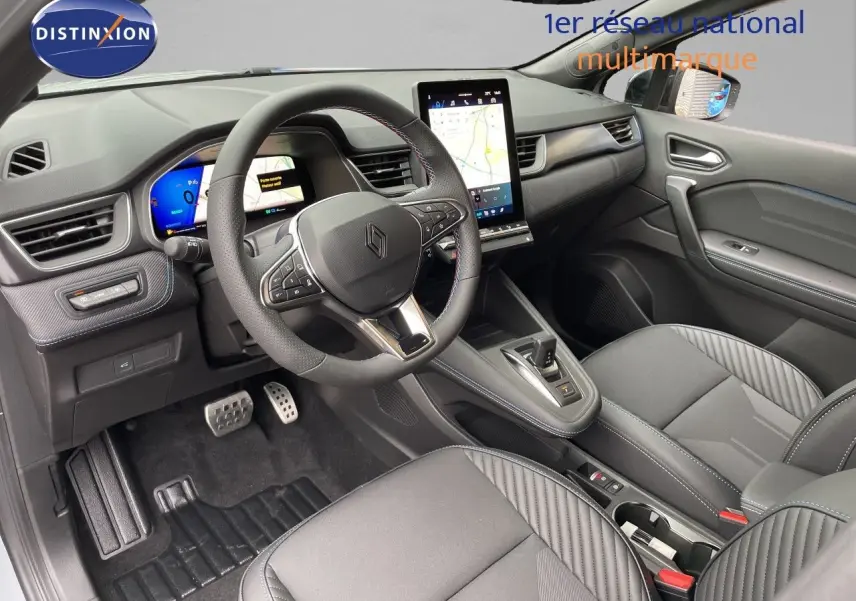 Vue intérieure côté conducteur du Renault Symbioz gris Rafale Métal, avec tableau de bord digital et écran tactile vertical.
