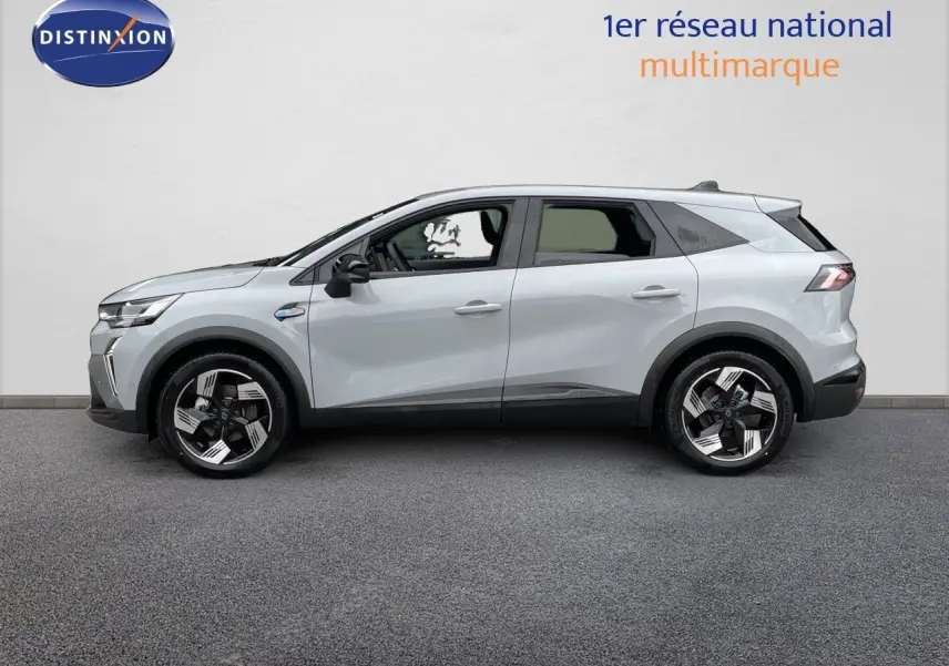 Profil droit du Renault Symbioz gris Rafale métal 2026, SUV hybride avec jantes noires et argentées distinctives.