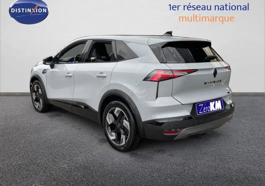 Vue 3/4 arrière droite du Renault Symbioz gris Rafale métal avec feux LED et jantes distinctives.