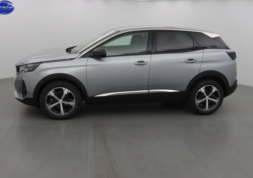 Peugeot 3008 gris Artense métal vue de profil côté gauche, avec toit blanc et jantes bicolores distinctives.