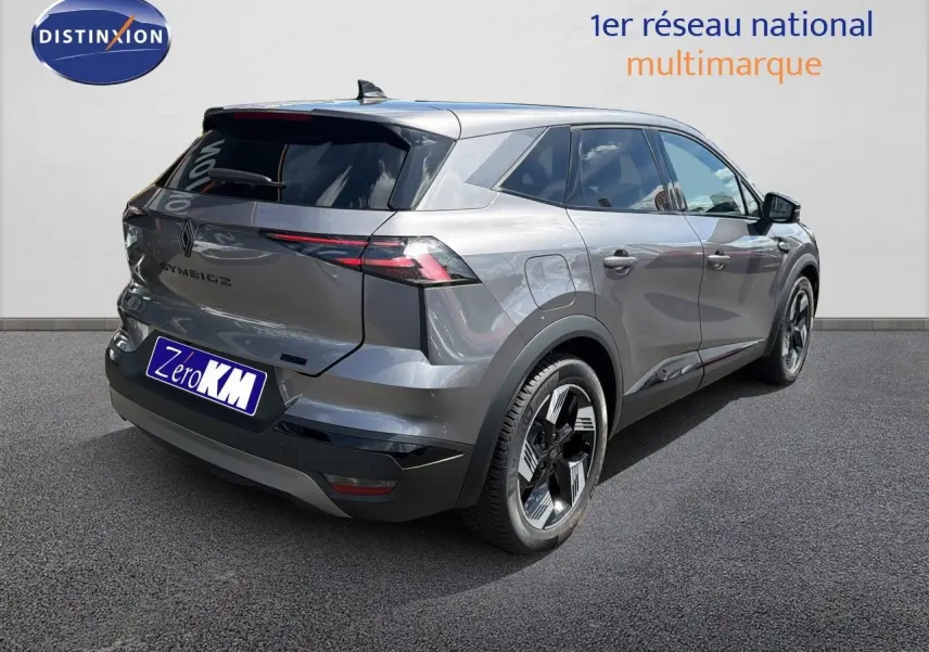 Vue 3/4 arrière droite du Renault Symbioz gris cassiopée métal avec feux arrière LED et jantes bi-ton.