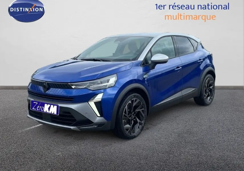 Renault Captur E-Tech hybride 2025 bleu Iron Metal avec toit gris, vue 3/4 avant côté gauche.