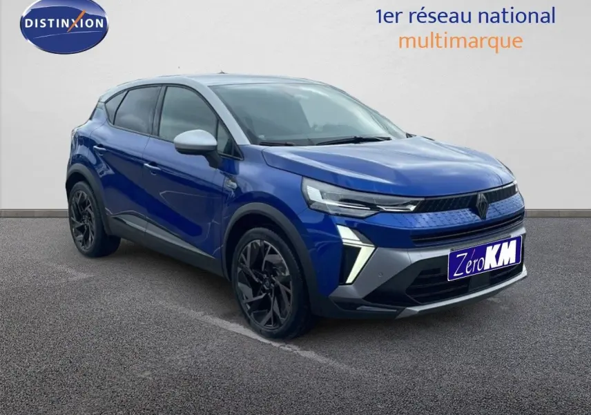 Renault Captur E-Tech hybride bleu Iron Metal avec toit gris, vue 3/4 avant côté gauche, jantes noires distinctives.