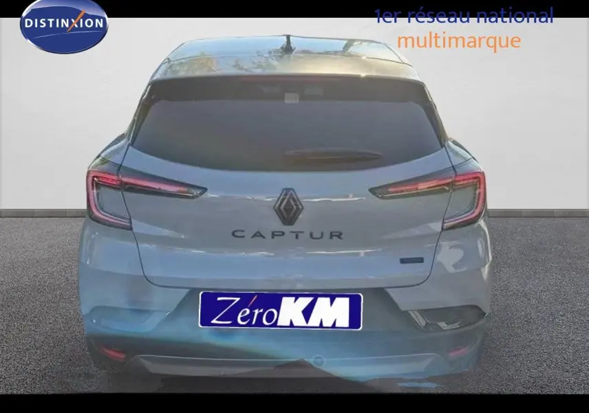 Vue arrière d'un Renault Captur gris Rafale métallisé avec toit gris, affichant ses feux LED caractéristiques.