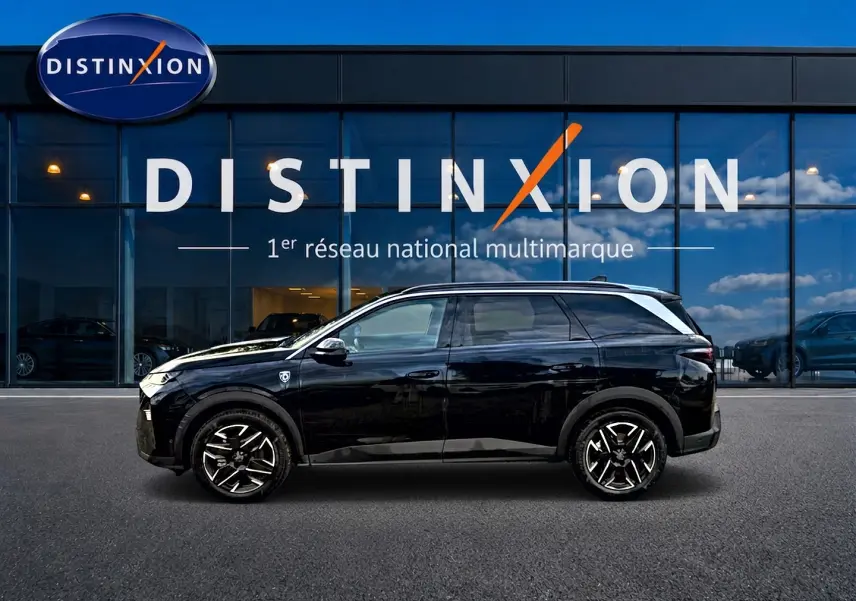 Profil latéral droit du Peugeot 5008 Hybrid 145 GT noir, avec jantes alu noires et toit contrasté blanc.