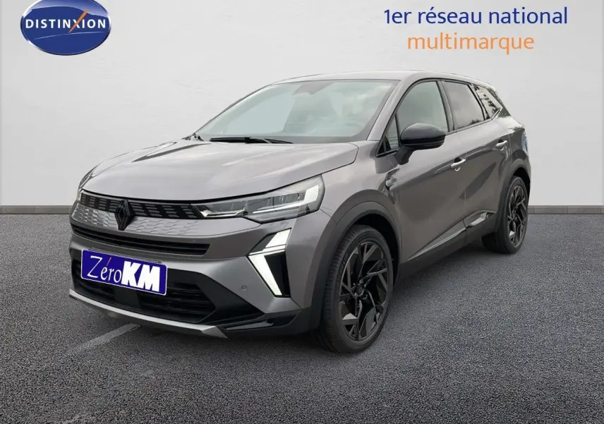 Renault SYMBIOZ gris cassiopée métal en 3/4 avant droit, avec calandre noire et jantes noires distinctives.