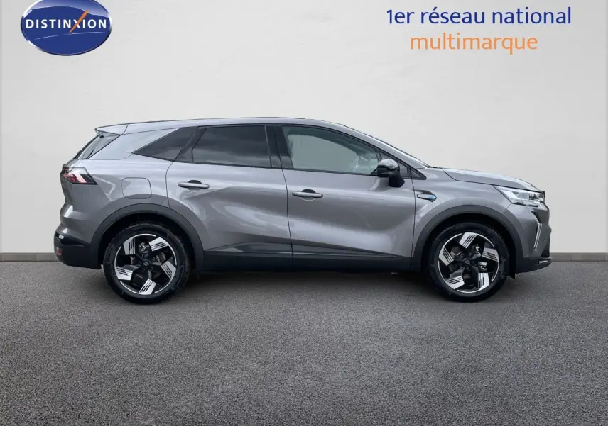 Profil droit du Renault Symbioz gris cassiopée métal 2026, avec jantes stylisées et vitres teintées.