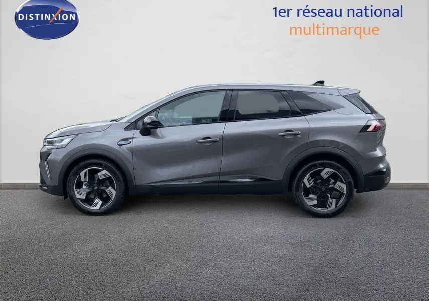 Vue de profil côté gauche du Renault Symbioz gris cassiopée métallisé avec jantes noires et détails modernes.