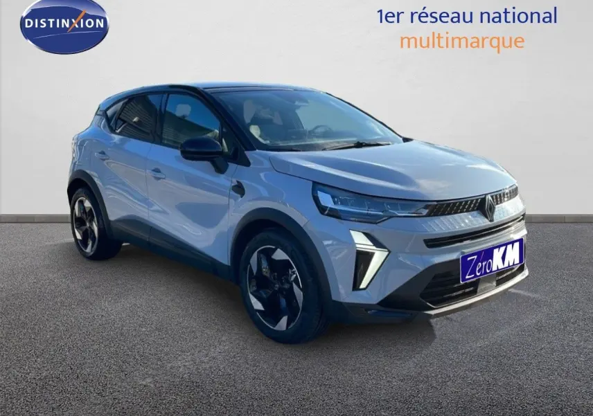 Renault Captur E-Tech hybride gris Rafale métal avec toit noir, vue 3/4 avant droit mettant en valeur ses optiques LED.