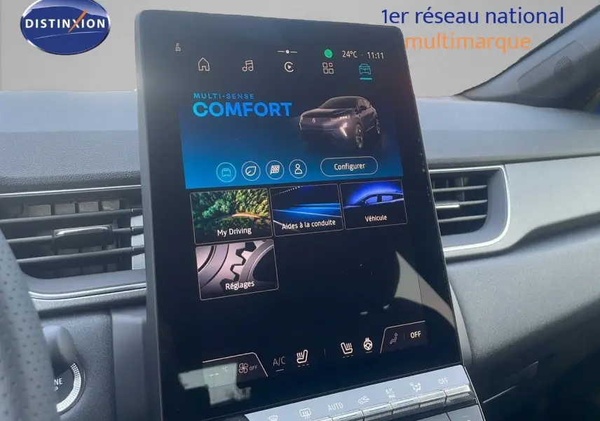 Écran tactile central du tableau de bord du Renault Captur 2025, affichant le mode confort en intérieur gris.