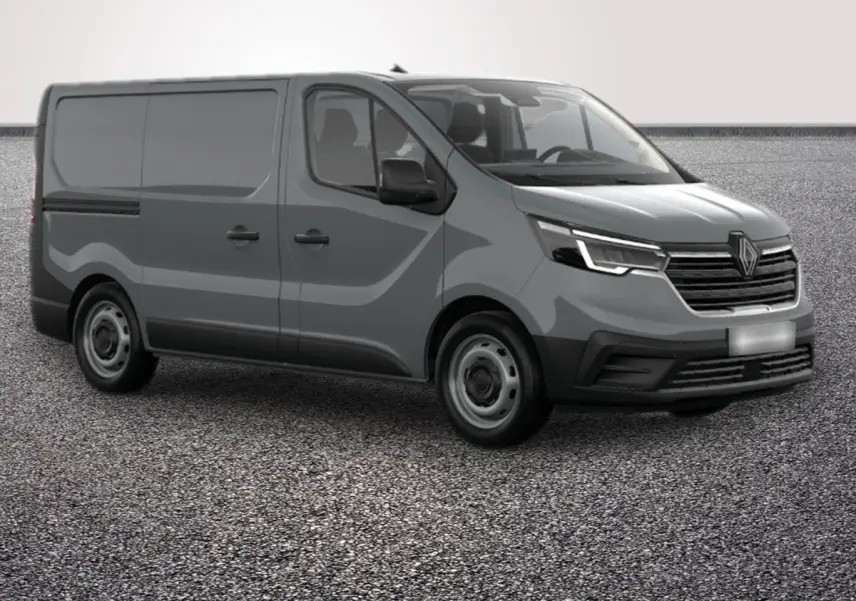 Vue 3/4 avant droit d’un Renault Trafic Fourgon gris foncé avec phares LED et calandre noire distinctive.