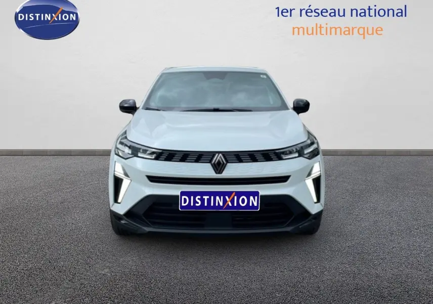 Vue avant d'une Renault Symbioz gris rafale métal avec calandre noire et feux LED verticaux allumés.