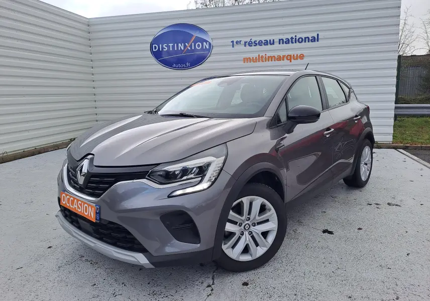 Renault Captur 1.6 E-Tech Hybrid 145ch Business gris cassiopée métal, vue 3/4 avant droit avec jantes alliage.