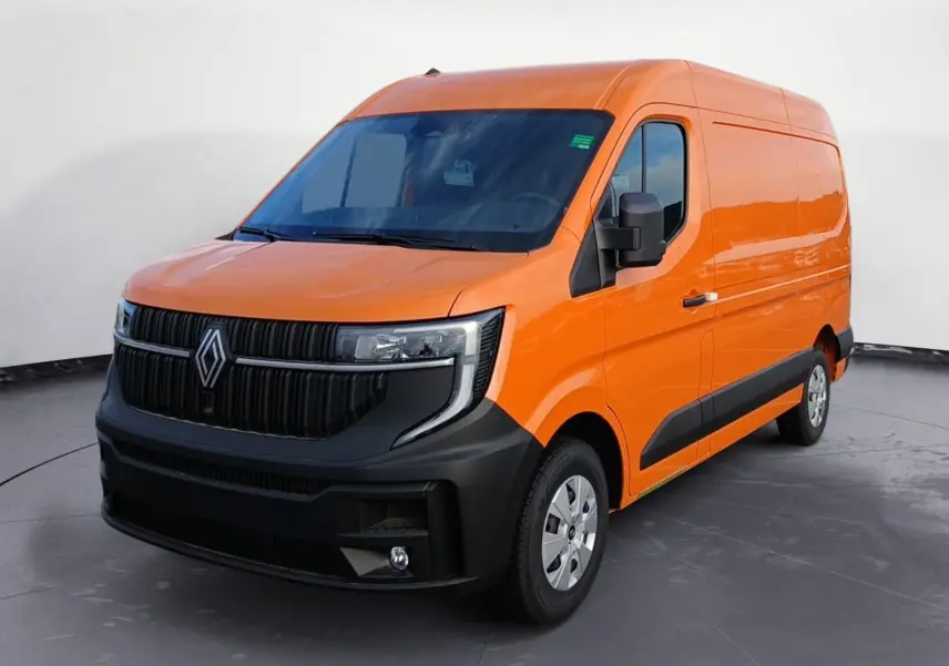 Vue 3/4 avant droit d’un Renault Master L2H2 orange avec calandre noire et pare-chocs avant noir mat.