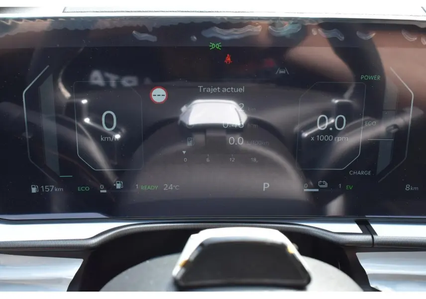 Tableau de bord digital 12,3'' du Kia Sportage hybride 2026, affichant les données de conduite en mode éco.