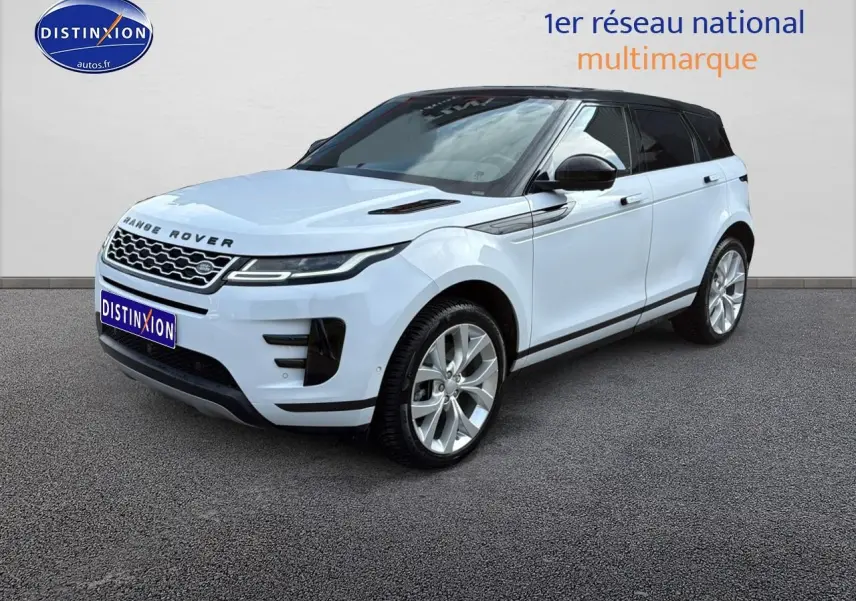 Range Rover Evoque blanc et noir vu en 3/4 avant droit sur fond neutre avec jantes alu et toit noir.