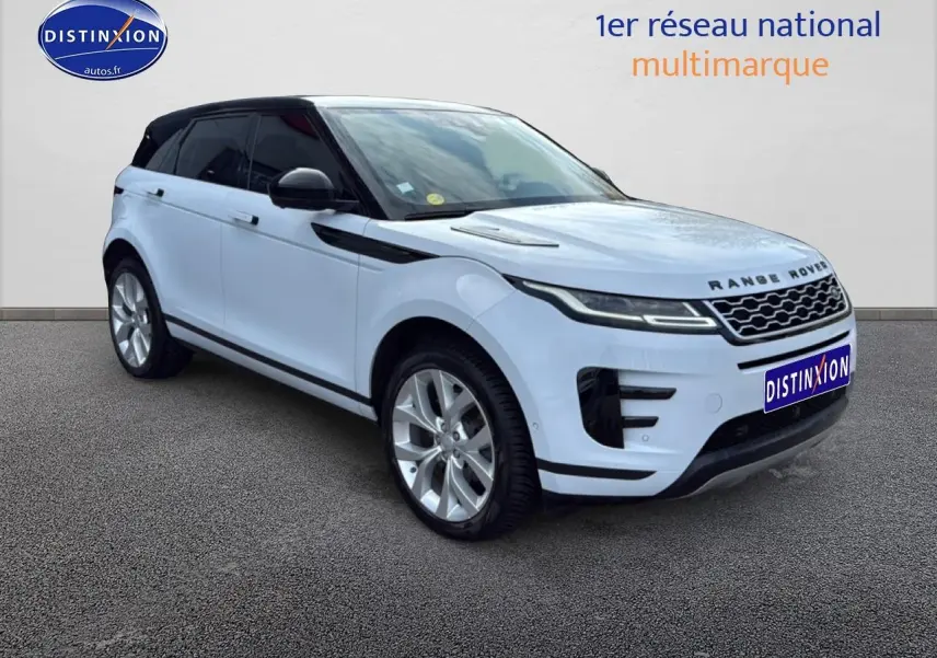Range Rover Evoque blanc et noir vue 3/4 avant droit, avec jantes alu et calandre distinctive noire.