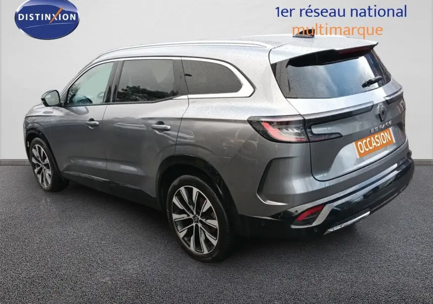 Vue 3/4 arrière droite d'un Renault Espace gris schiste métallisé, avec jantes alliage et vitres teintées.