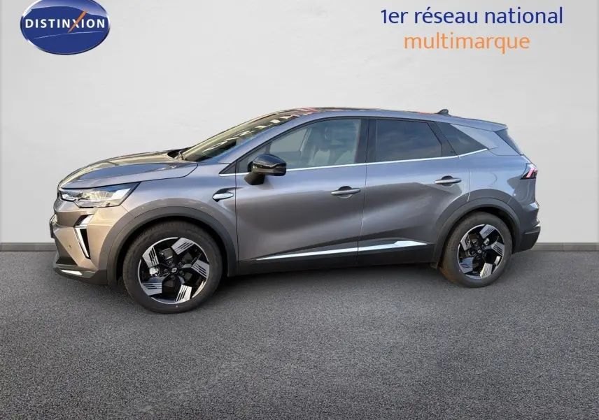 Profil droit du Renault Symbioz gris cassiopée métal 2026, mettant en valeur ses jantes bicolores et lignes modernes.