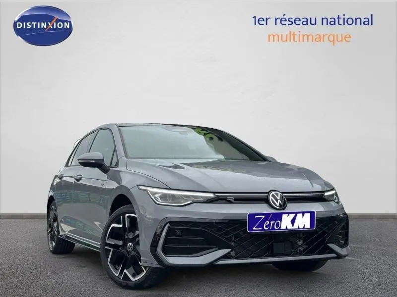 Volkswagen Golf 2.0 TDI R-Line gris Urano vue 3/4 avant avec jantes alu et calandre sportive noire.