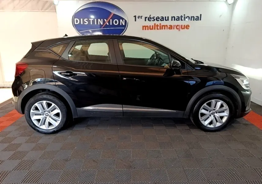 Profil côté gauche d'un Renault Captur Business noir 2021, avec jantes alliage et rétroviseurs noirs brillants.